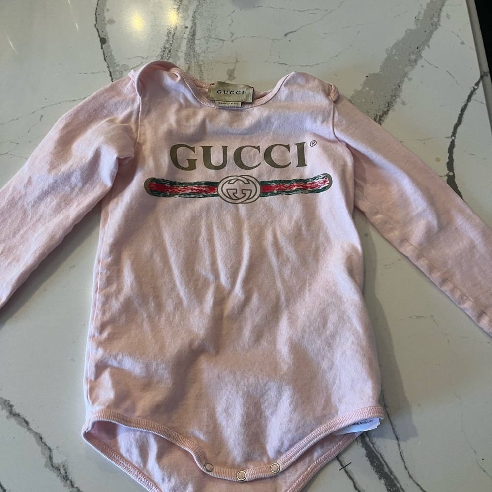 Gucci baby onesie